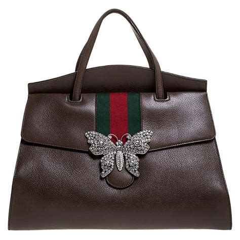 gucci butterfly cap|gucci bag with butterfly buckle.